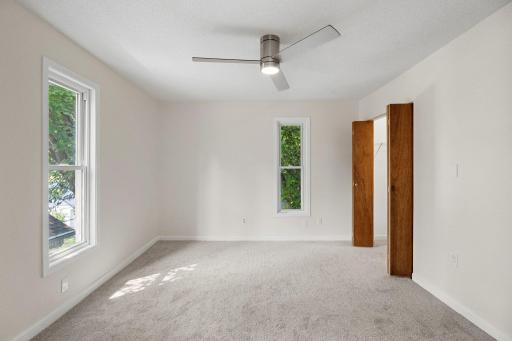 Primary bedroom is spacious, freshly painted and like the other rooms in the upper level has new carpet-July 2026.