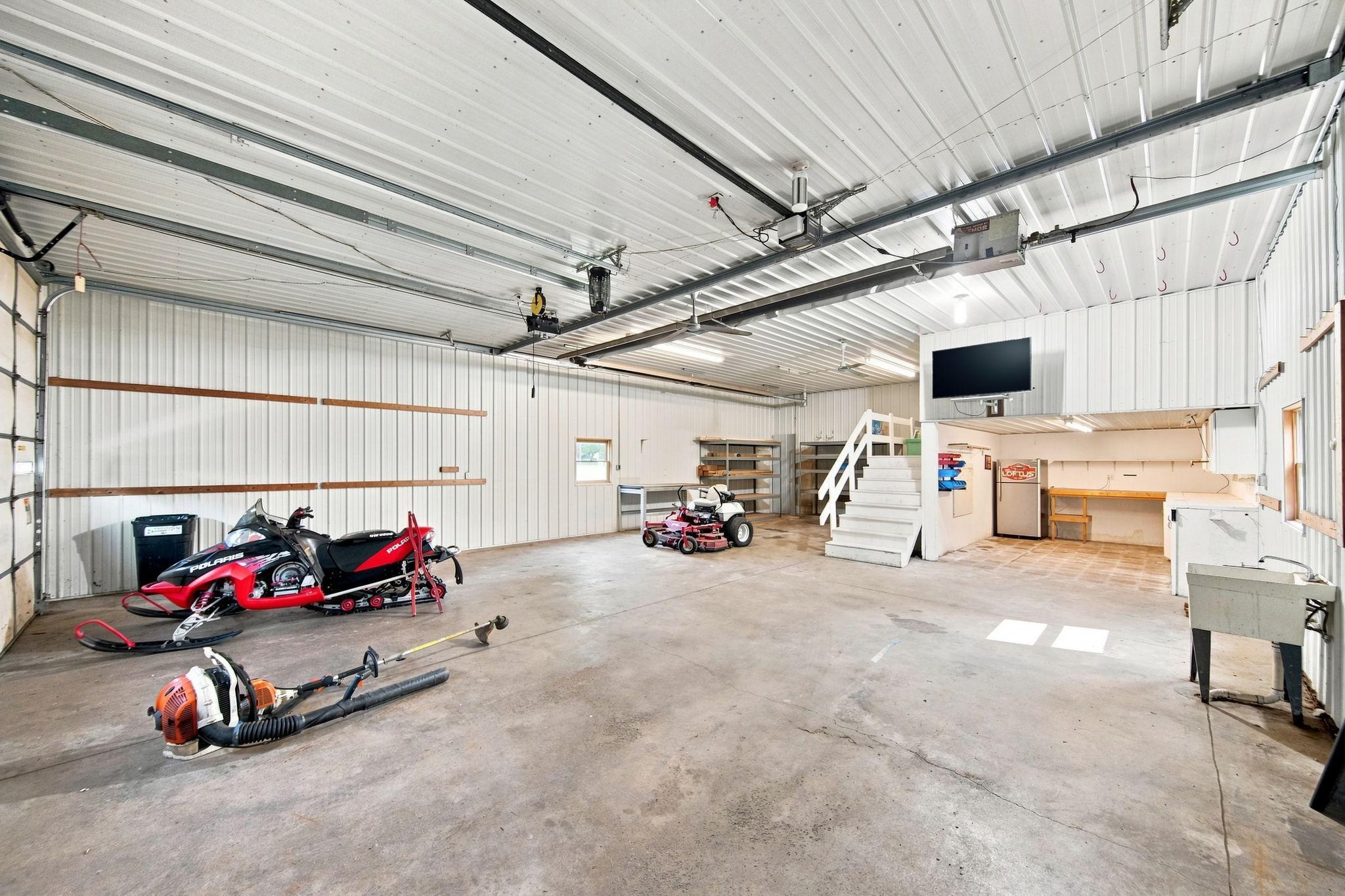 Inside the detached garage! Shop is heated and has water!