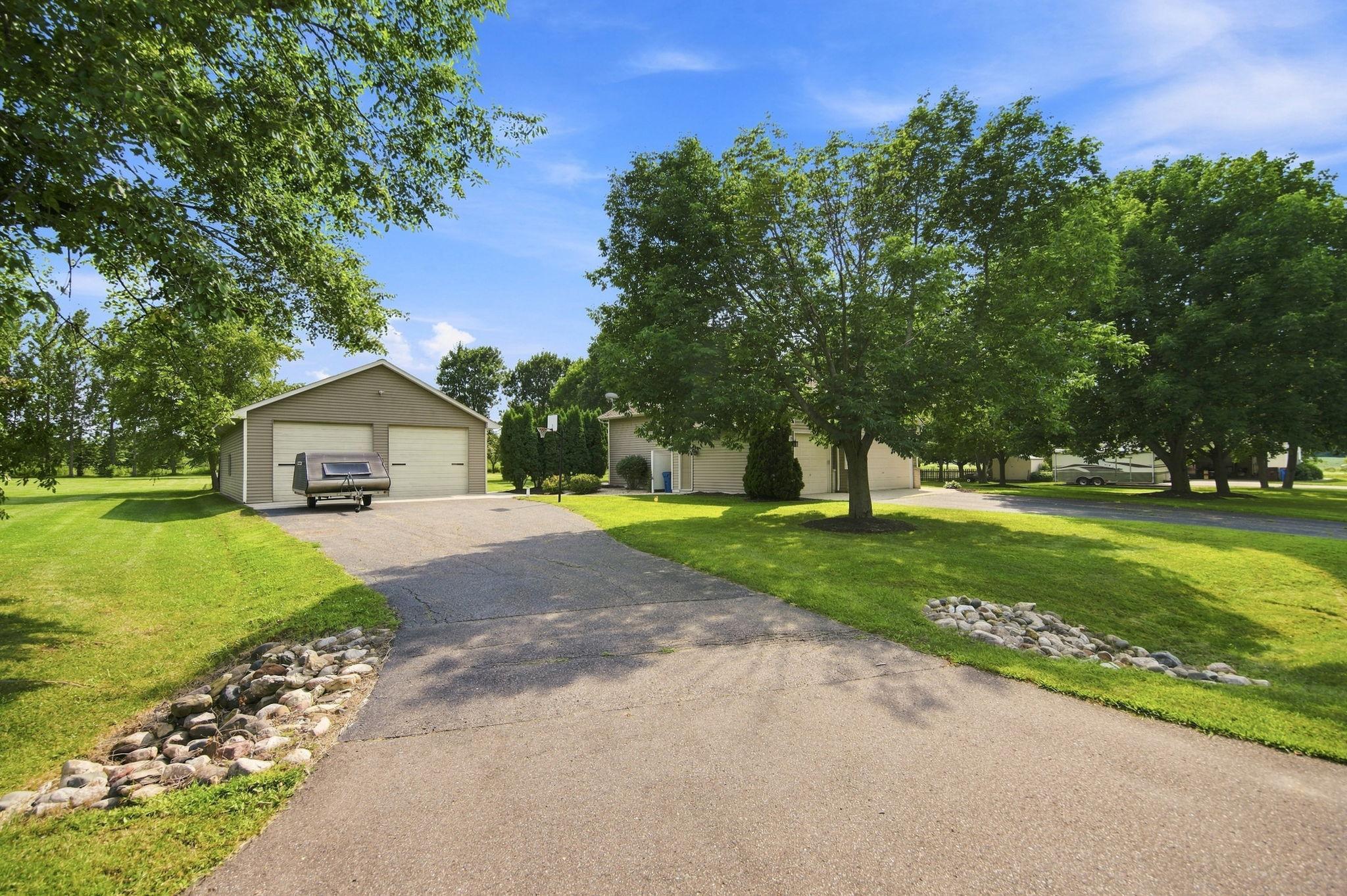 Incredible 32x48 detached garage! 2 separate driveways.