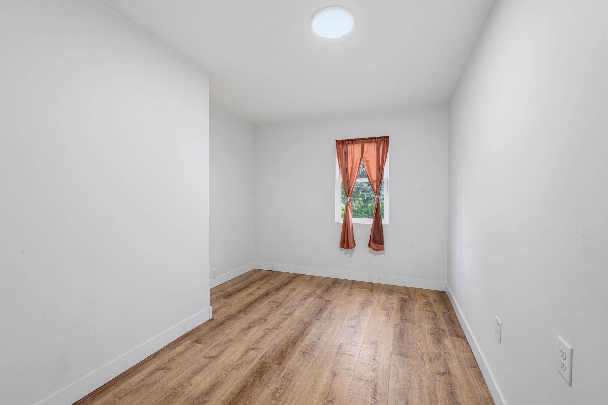 The primary bedroom features LVP flooring.