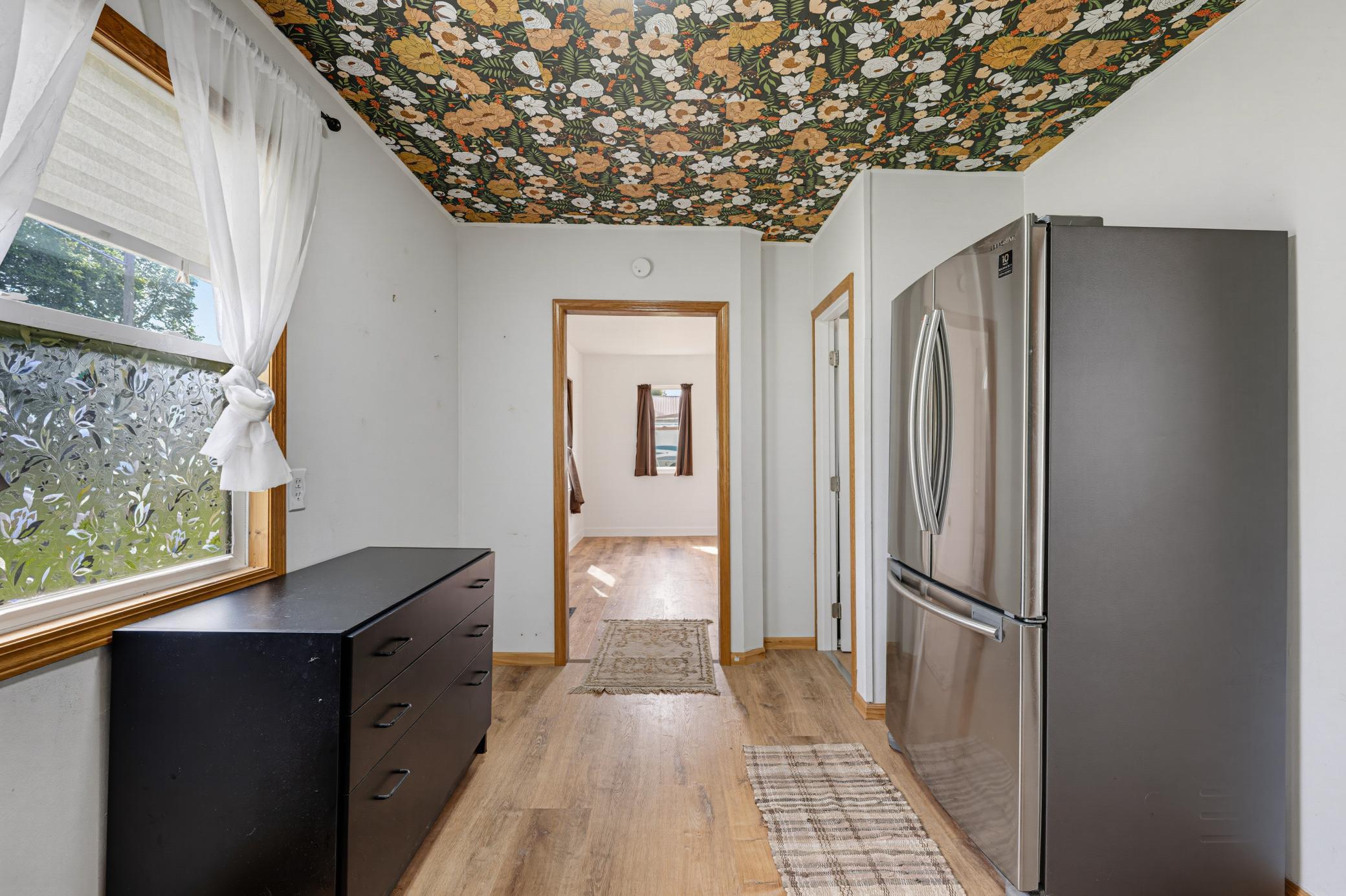 The kitchen features a suite of S.S. appliances. Durable LVP flooring is featured throughout the home.