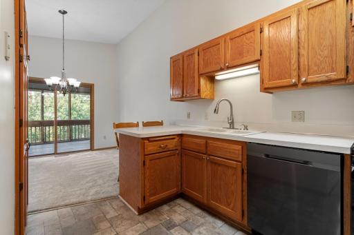Kitchen with Stainless steel & black appliances