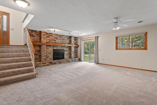Walkout lower level family room. Patio door leads to outdoor patio
