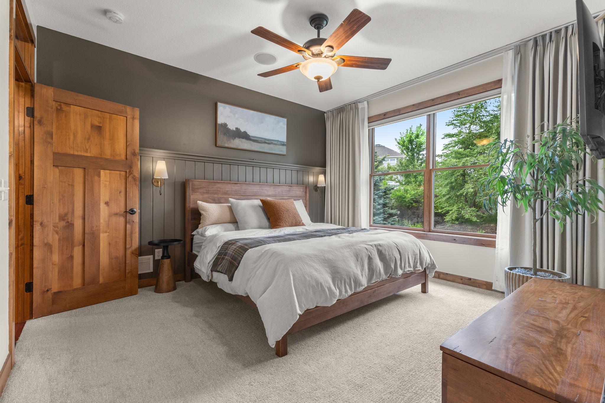 Spacious primary suite on the main floor offers a true retreat!