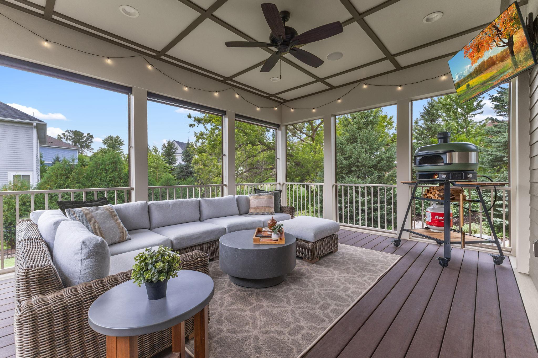 Elevated, oversized screened porch overlooking the fenced, professionally landscaped .4-acre backyard!