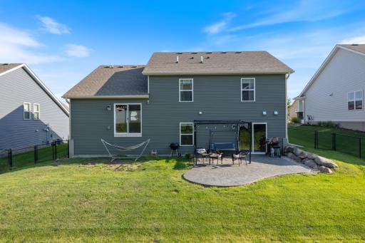 Walkout to a large stamped concrete patio. Perfect for bbqs and gatherings.