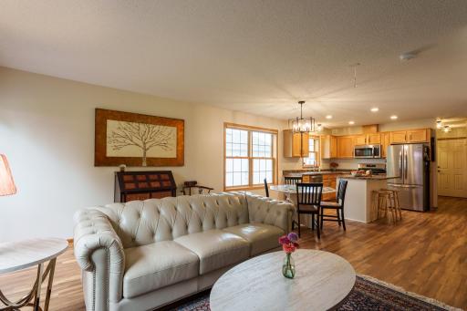 The main level features an open-concept floor plan with a spacious kitchen, dining area and living room, perfect for everyday living or entertaining
