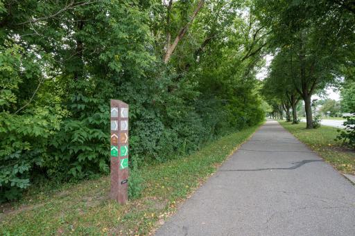 Take in the scenery, explore the trails, enjoy time along the river, bring the dog outside, or simply appreciate having so much green space nearby. The surrounding development is beautifully nestled among the trees and trails!
