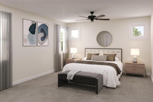 Primary bedroom - photo is of model home with the same floorplan