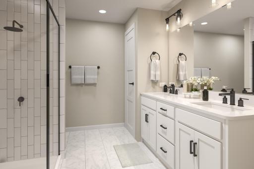 Primary bathroom - photo is of model home with the same floorplan