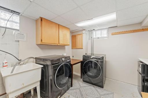 Large laundry and utility room with lots of space for storage