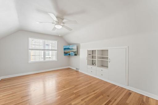 Large Upper Level Primary Bedroom with built-ins, and room to add an ensuite bath and walk-in closet!