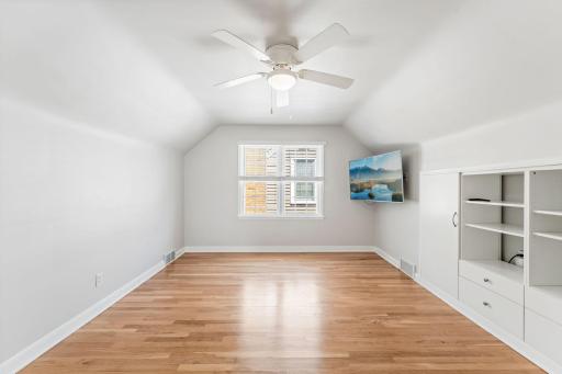 Large Upper Level Primary Bedroom with built-ins, and room to add an ensuite bath and walk-in closet!