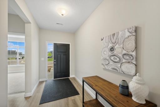 Entry - image is of a former model home for visual purposes.