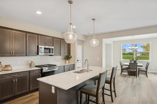 Kitchen - - photo is of a previous inventory home. Inquire for more details and options.