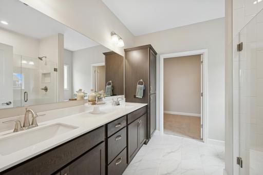 Primary Suite Luxury Bathroom - photo is of a previous inventory home. Inquire for more details and options.