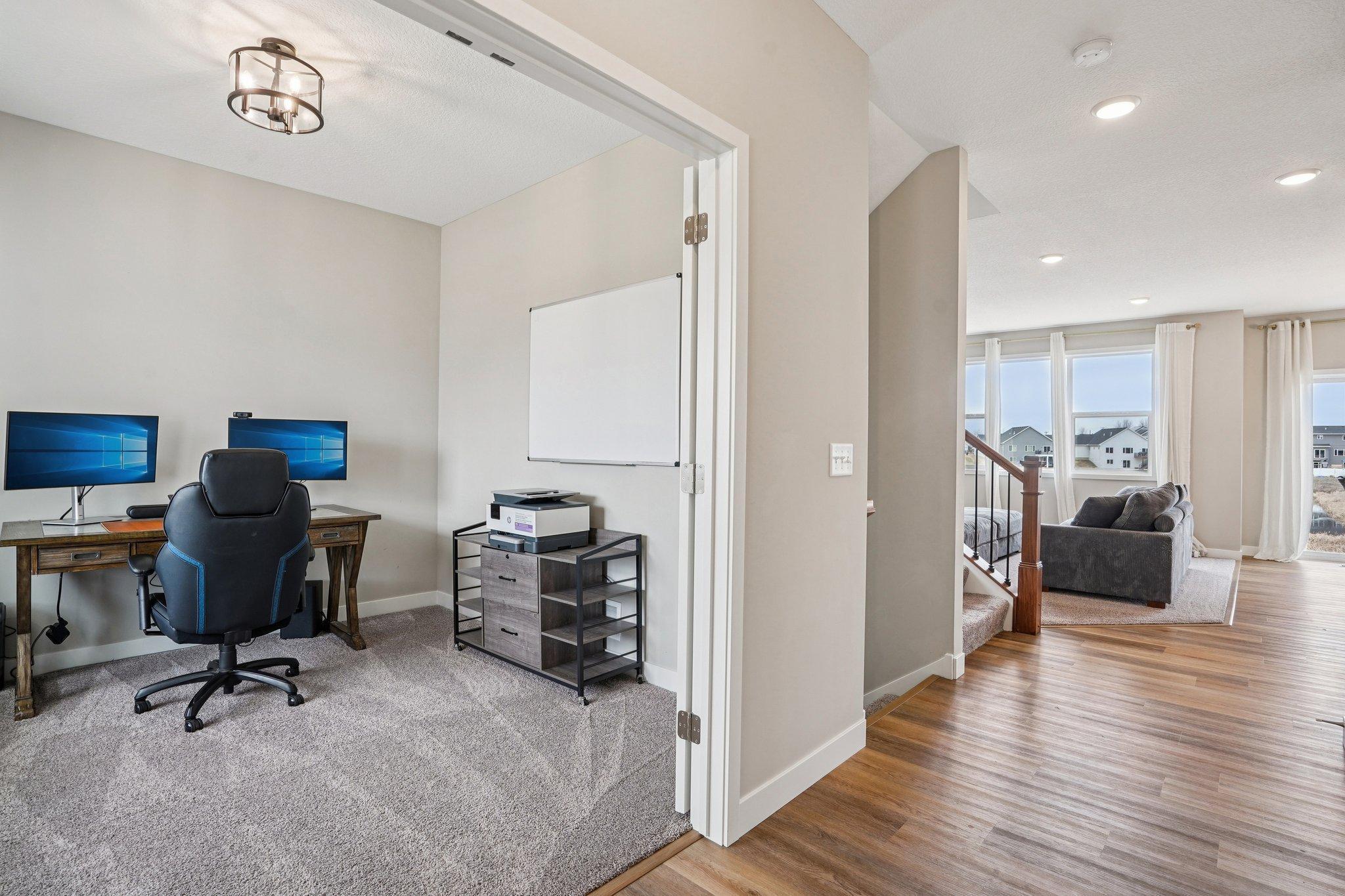 Front room perfect for an office, sitting area or play room!