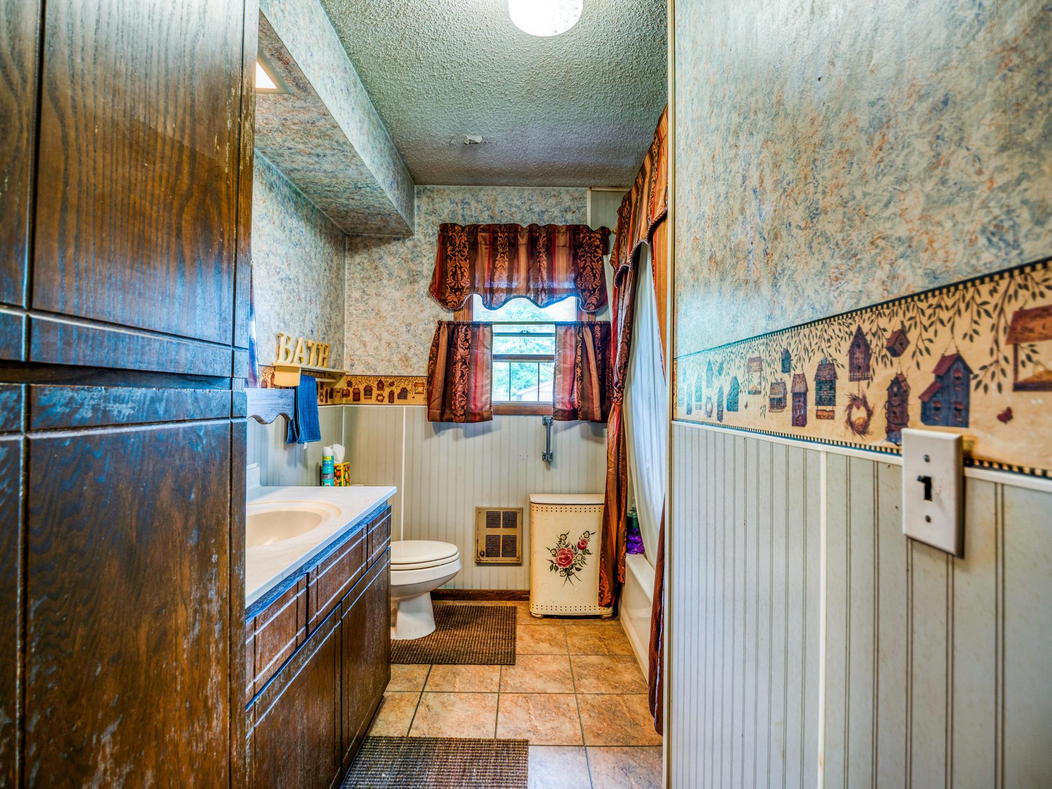 Main floor bathroom - great storage closets!!!