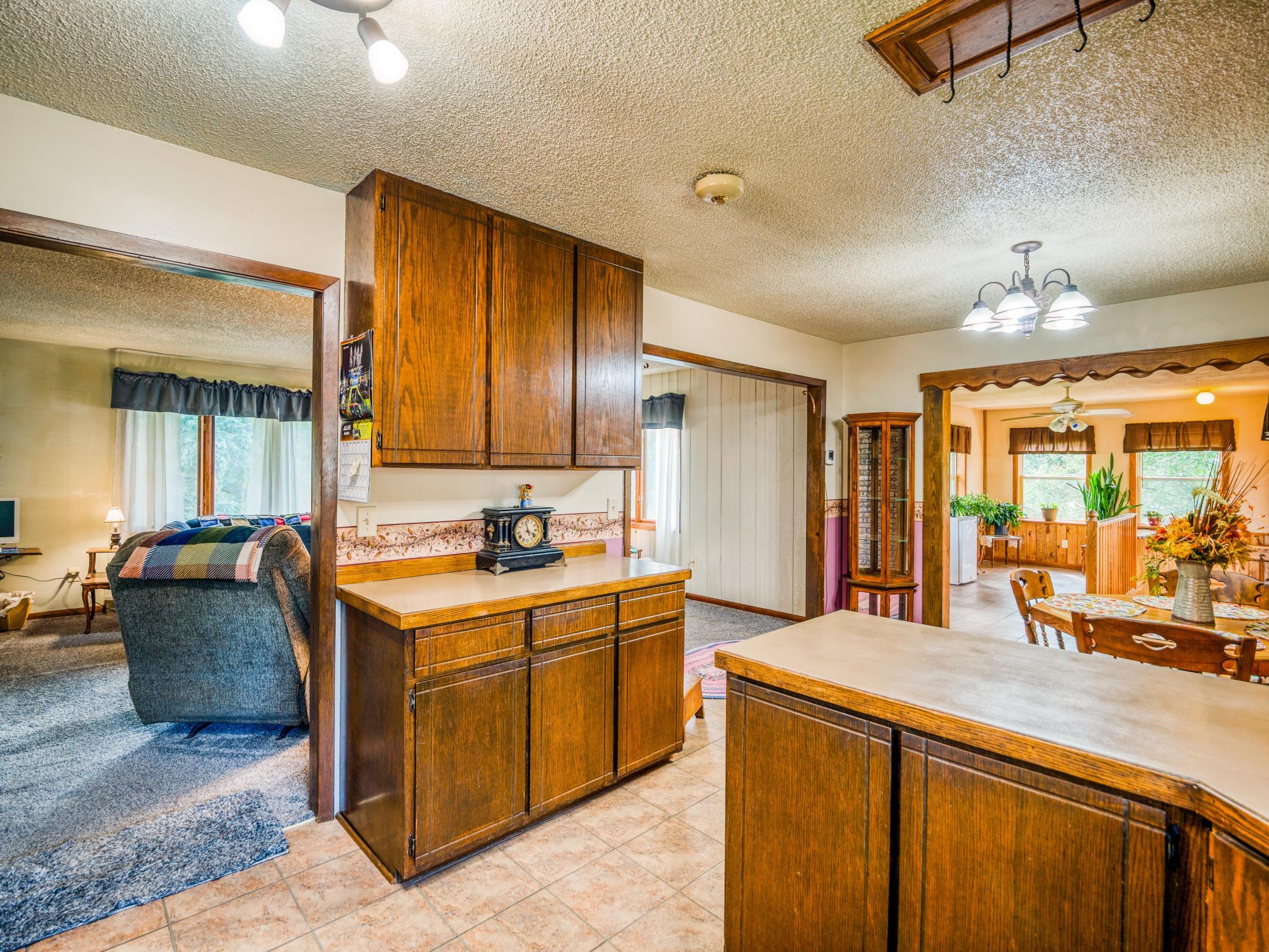 View from kitchen into dining area and sun room