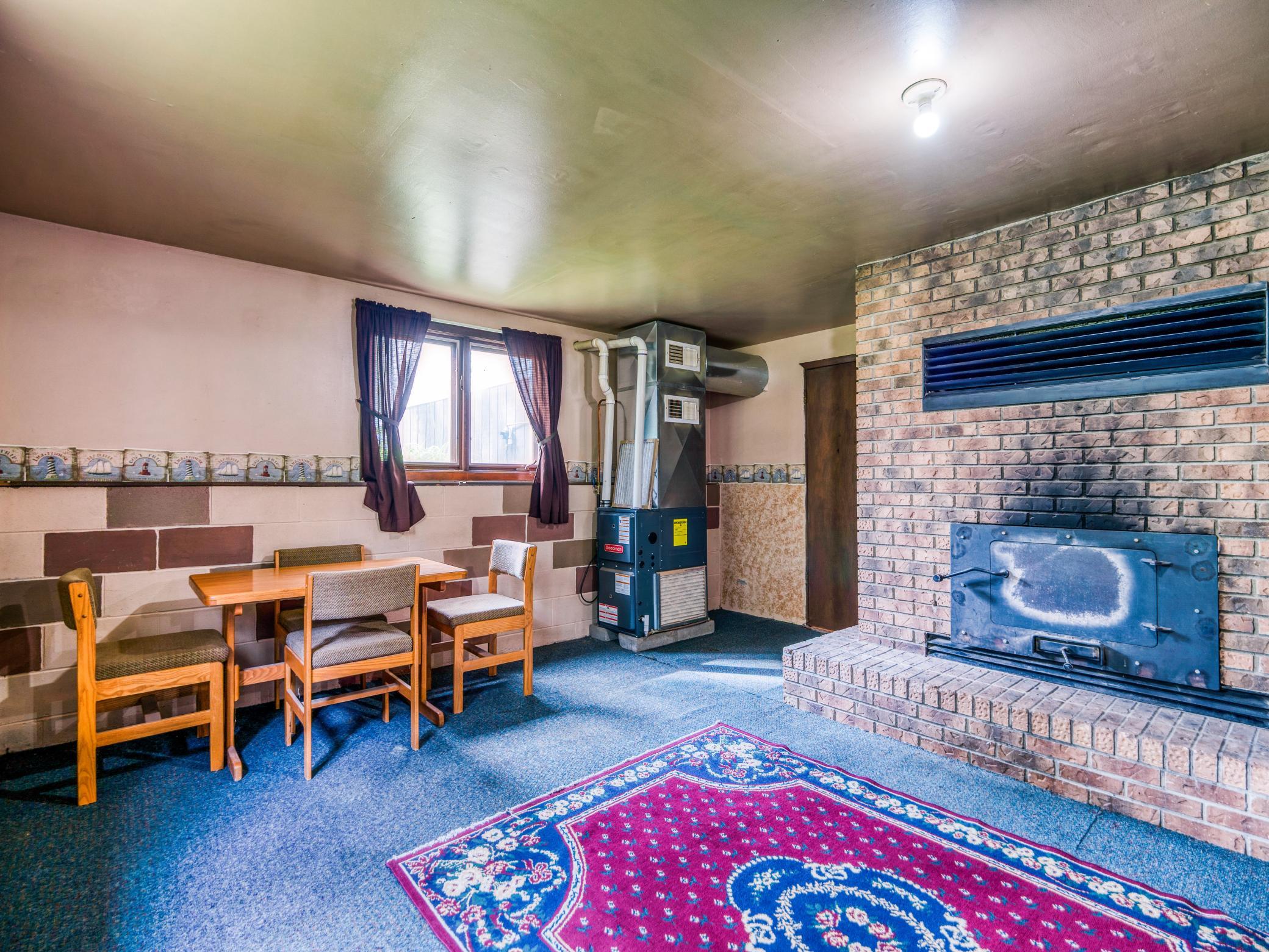 Lower level living area with fireplace