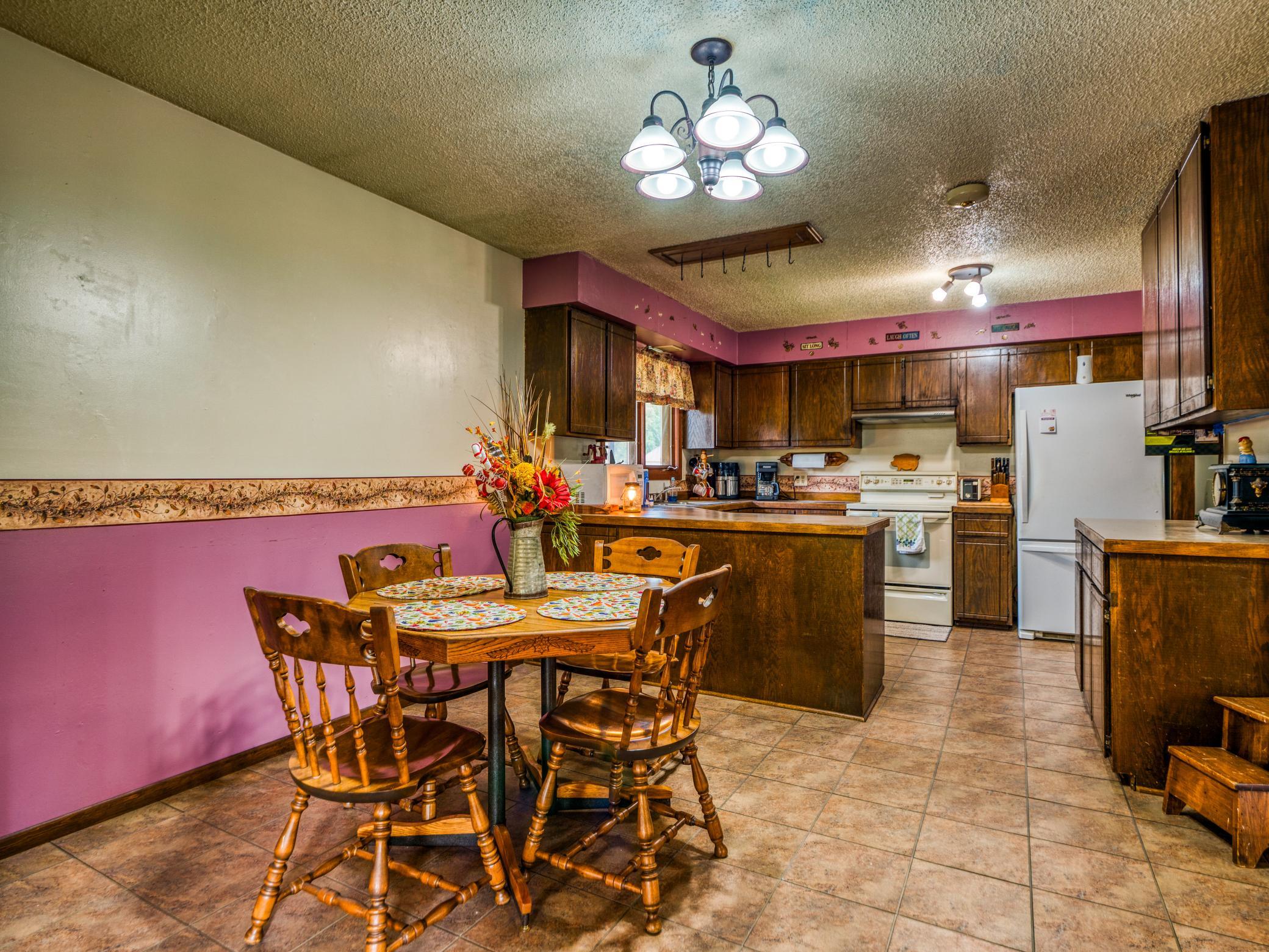 Dining area looking into kitchen