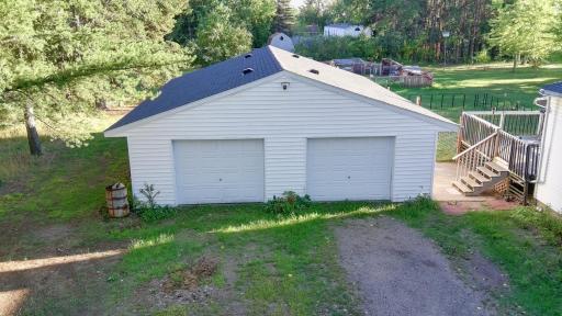 Oversized 4 car garage also has new roof!