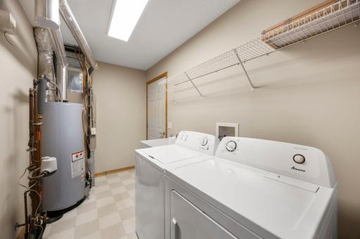 Washer/Dryer/ Mechanicals with door to the garage room
