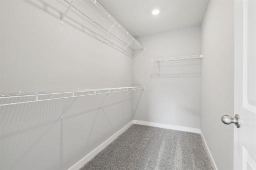 The primary bedroom boasts a massive walk-in closet! *Pictures of model home, options may vary.