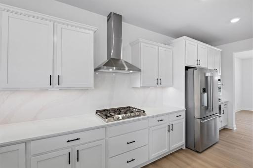 Residents can seamlessly transition between cooking and serving piping-hot courses on the dining table