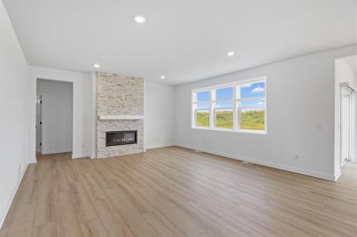 Enjoy shared moments with loved ones in the comfortable and spacious Great Room, where expansive windows flood the space with natural light.