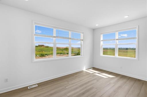 The morning room provides a sunlit space for meals of any kind, just off the kitchen.