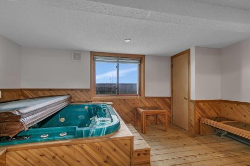 The hot tub provides views of the lake no matter the season