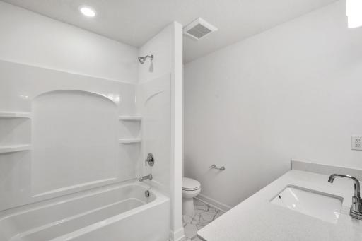 (Photo of a similar home, actual finishes may vary)
