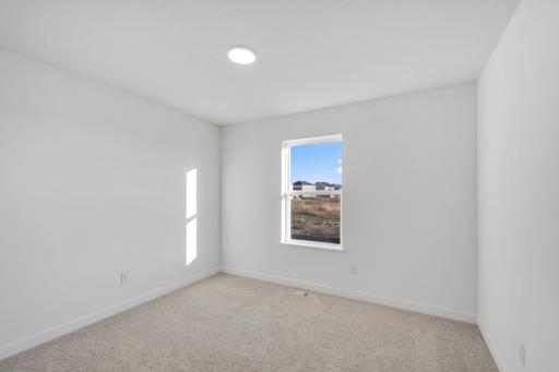 (Photo of a similar home, actual finishes may vary)