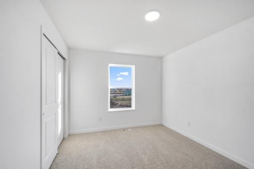 (Photo of a similar home, actual finishes may vary)
