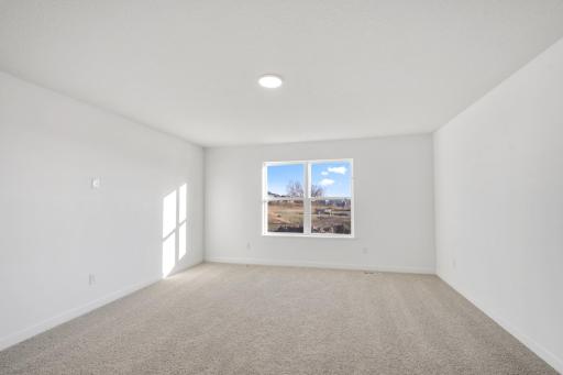 (Photo of a similar home, actual finishes may vary)