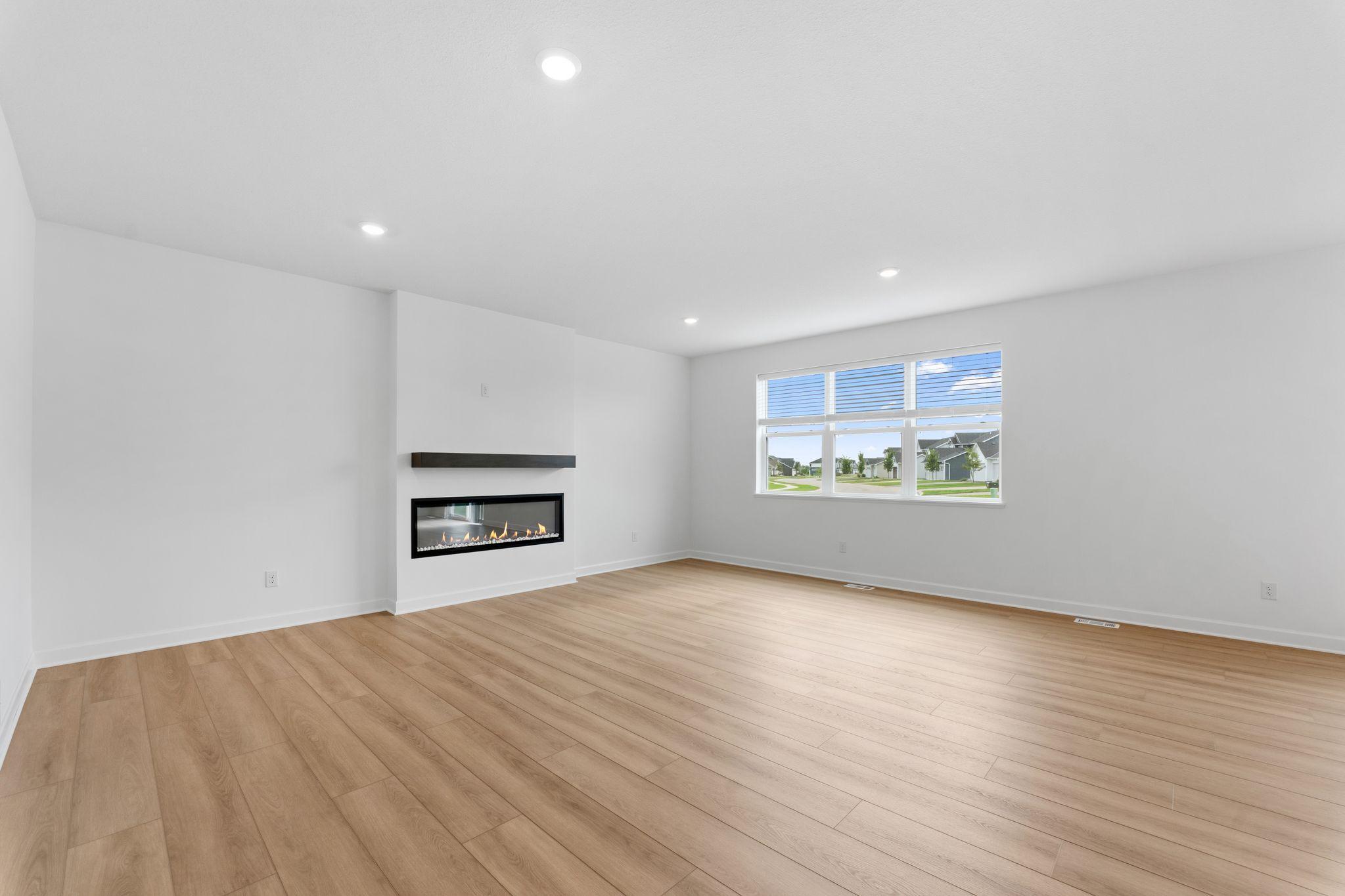 Curl up with a good book or enjoy family movie nights in the spacious yet cozy Great Room.