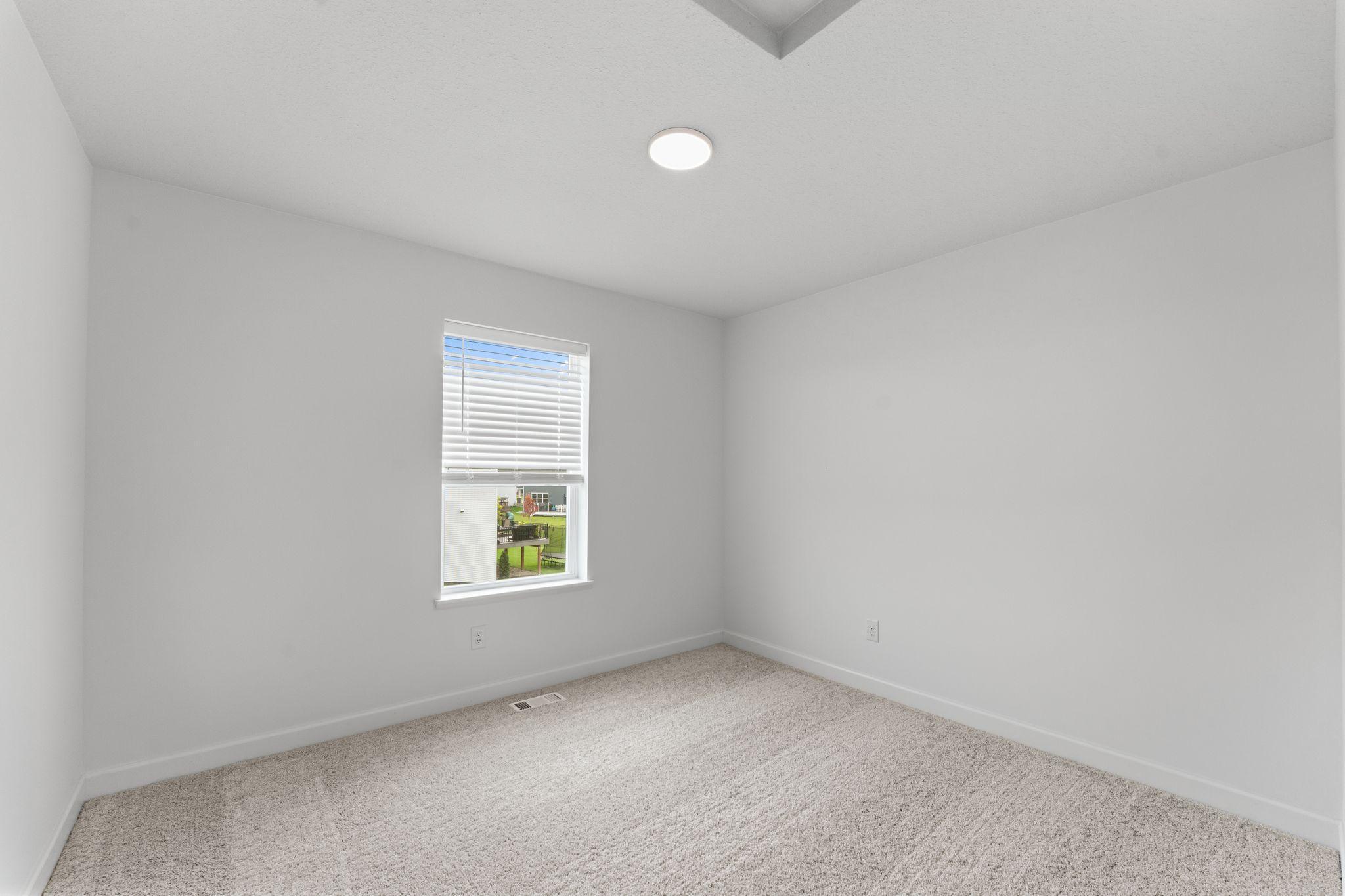 The secondary bedrooms offer comfort and privacy.