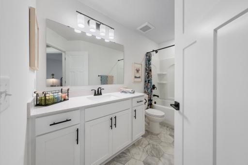(Photo of a decorated model, actual homes finishes will vary)