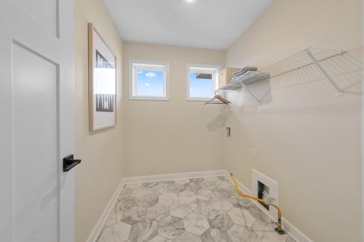 (Photo of a decorated model, actual homes finishes will vary)