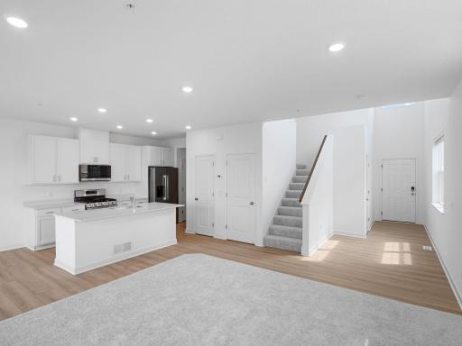 The Great Room flows up to the second floor, perfect for residents that want to retire after a long day