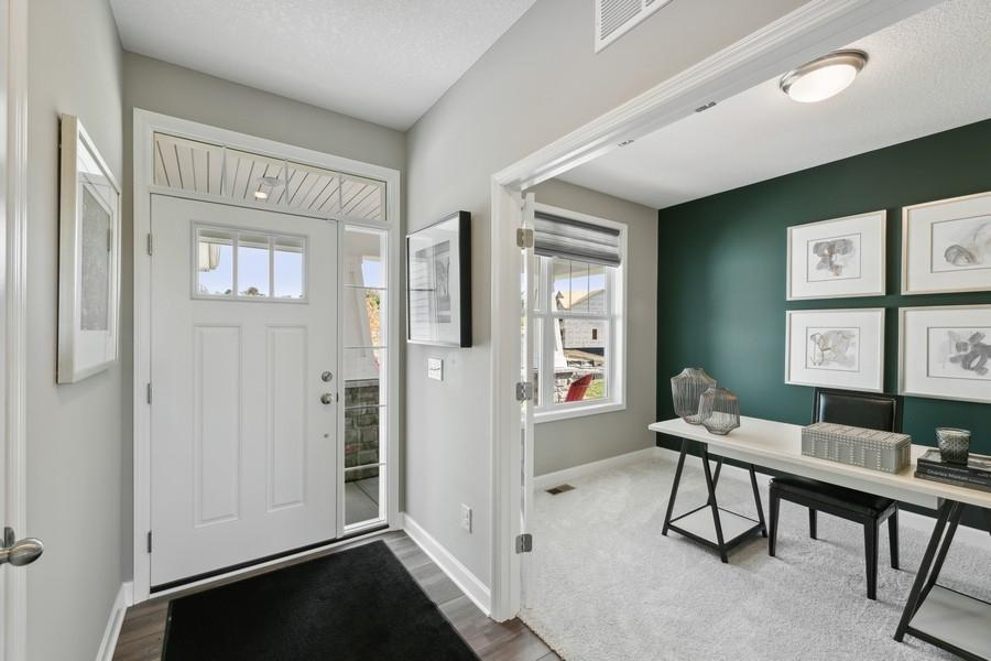 (Photo of decorated model, colors and features will vary) Fabulous and multi-purpose main level office enjoys natural light and privacy.