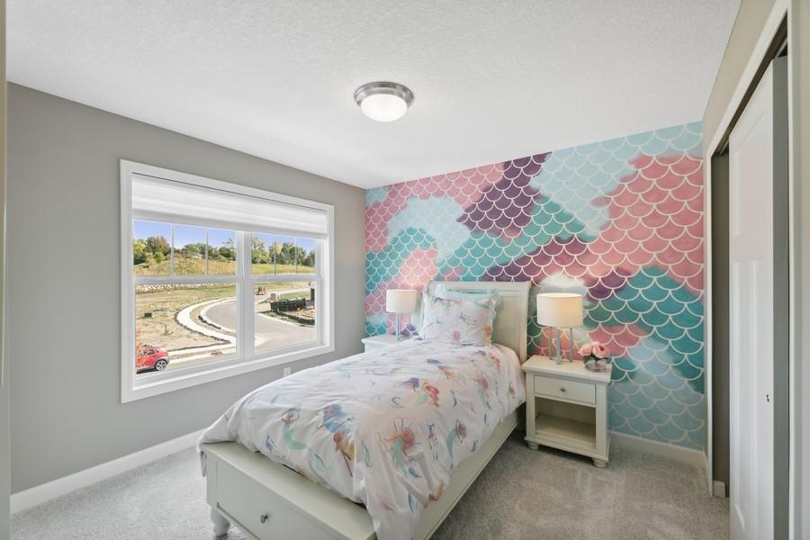 (Photo of decorated model, colors and features will vary) The second secondary bedroom.