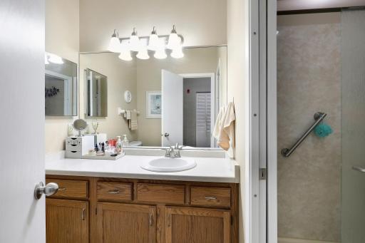 The shower can be closed off by the pocket door while a guest is using the restroom.
