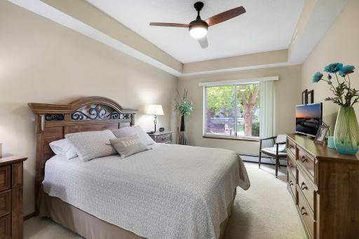 Spacious bedroom with southern views of the trees.