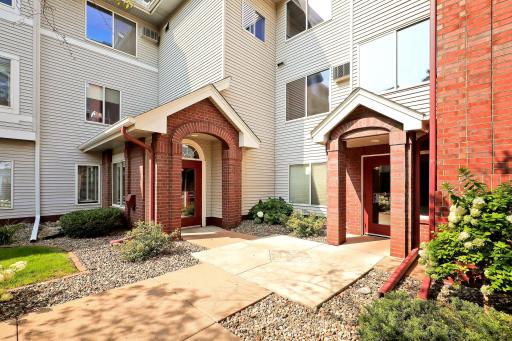 The door to the condo is on the left. The door to the right is how to utilize the elevator. Or you can walk up from the heated garage, which gives you direct access to the condo.