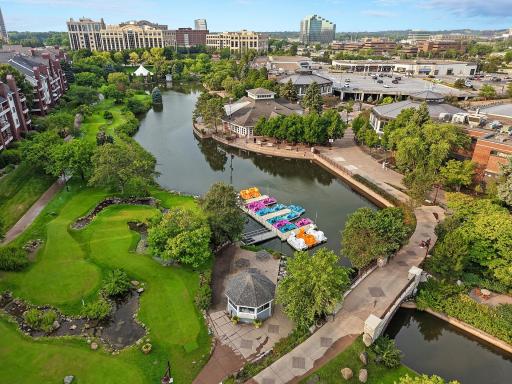 Enjoy all the lake offers! Walking paths, mini golf, pedal water floats. Shopping, groceries, Core Power Yoga, restaurants, and so much more! You'll see the white topped amphitheater off the south end of the lake.