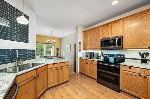 View of the kitchen overlooking the informal dining area.