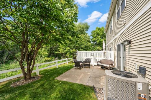 This great home a fabulous rear patio area overlooking trees and wildlife!