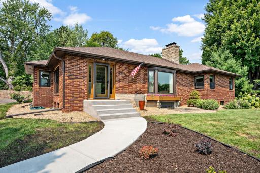 Plenty of curb appeal on this all-brick beauty with brand new front steps and path to driveway!